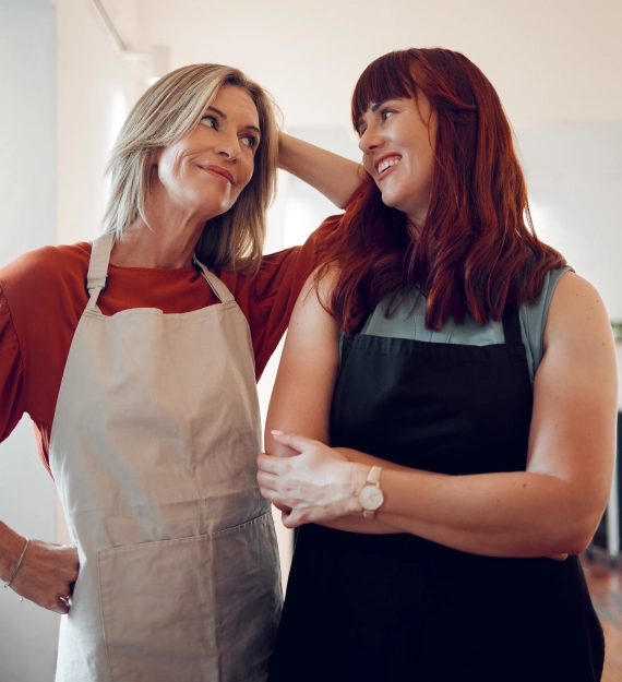 small-business-women-in-salon-and-success-in-hair-salon-startup-partnership-growth-development-and-vision-hairdresser-business-owner-partners-or-friends-working-together-in-hair-care-team-in-shop